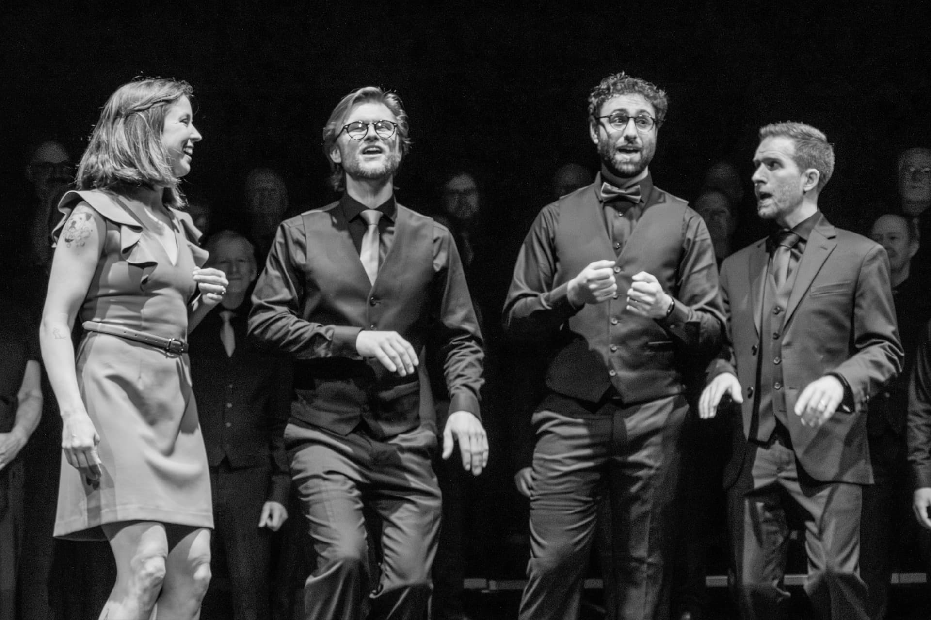 Constellation Quartet singing in black and white
